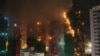 زبانه‌های آتش و ستون‌های دود بر فراز برج‌های مسکونی هنگ کنگ