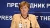 German Chancellor Angela Merkel speaks during a news conference in Belgrade, Serbia. 