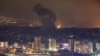 Smoke billows over Beirut's southern suburbs after an Israeli strike on October 7. 