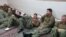 U.S. sailors are seen in an undisclosed location in Iran in this handout picture released on the official website of Iran's Islamic Revolutionary Guards Corps on January 13.