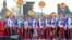 Athletes of the Russian Olympic Committee attend a welcoming ceremony after returning from the Tokyo 2020 Olympic Games on Red Square in Moscow, on August 9, 2021. 