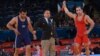 UK -- Armenia's Arsen Julfalakian (R) beats Azerbaijan's Emin Ahmadov on his way to a silver medal in the Men's 74Kg Greco-Roman wrestling during the London 2012 Olympic Games, 05Aug2012.