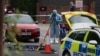 A member of the forensic team works at the scene after a man was arrested following a stabbing incident in the Golders Green area, which is home to a large Jewish population, in London on April 29.