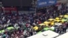 Iranian protesters shout slogans as they gather in a street close to a bazaar in Tehran, Iran, 25 June 2018