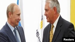 Vladimir Putin və Donald Trump-ın dövlət katibi təyin etdiyi Rex Tillerson