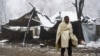 A migrant walks at the Vucjak refugee camp outside Bihac on December 3.