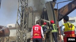 Firefighters extinguishing the fire at Zargan Power Plant in Ahwaz, Iran. July 4, 2020. 