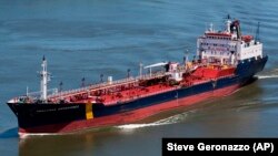 The ship that would later be named Asphalt Princess sails through Quebec City, Canada, in 2012.