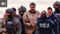 Николас Мадуро в окружении сотрудников американских спецслужб. 3 января 2026 года 