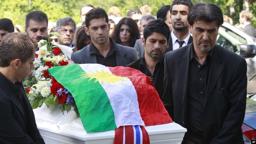 Mourners push the coffin of Bano Abobakar Rashid, 18, the first victim of the shooting rampage at Utoeya to be buried, during her funeral at a church in Nesodden on July 29.