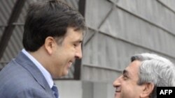 Saakashvili (left) and Sarkisian in friendlier times