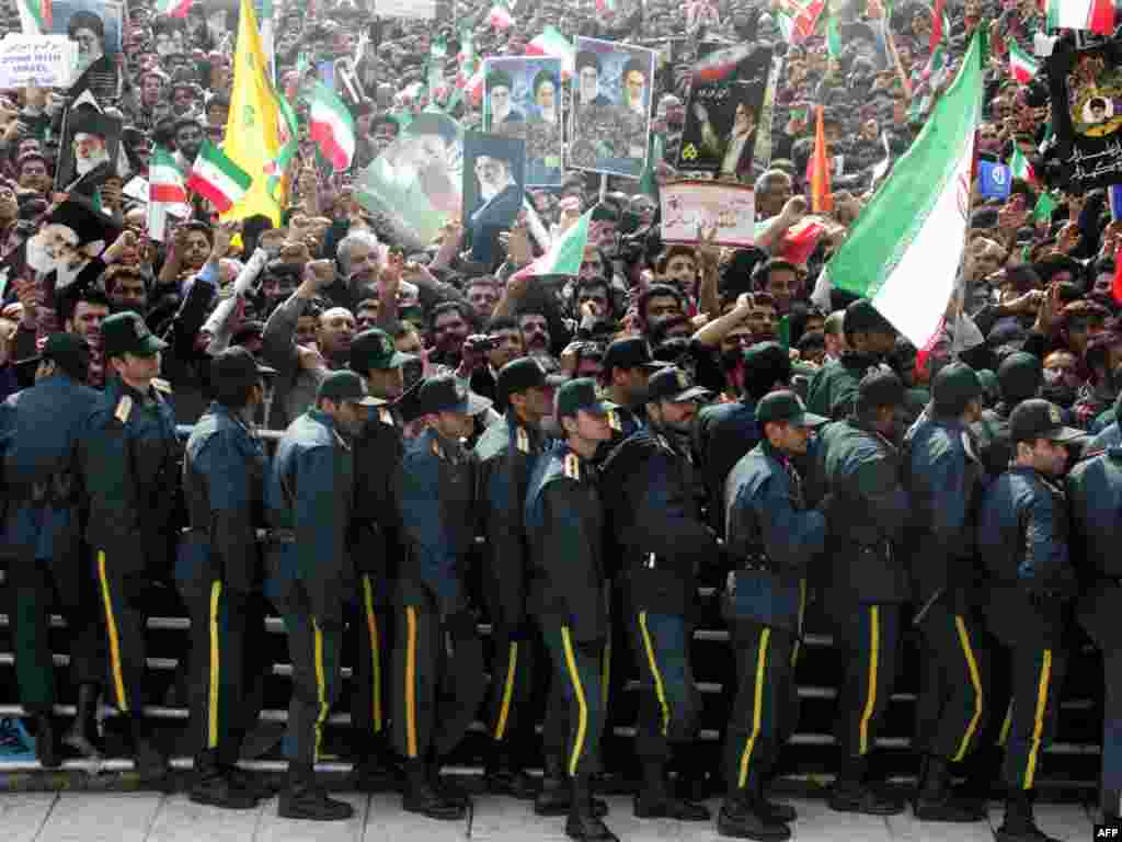 Iranian security forces deployed as part of celebrations marking the 31st anniversary of the Islamic Revolution. - Opposition leaders are reported to have come under attack and their supporters clashed with police during the rallies.