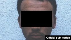 Кармалган киши