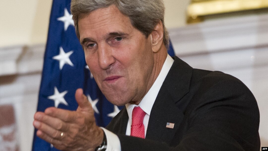 U.S. Secretary of State John Kerry is pressing the UN Security Council to pass a resolution including the threat of force if Syria fails to abide by a U.S.-Russian plan to place its chemical weapons under international control.