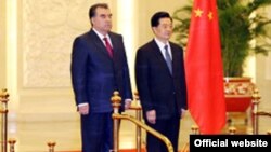 China -- Emomali Rahmon, the president of Tajikistan (L) with Hu Jintao, the president of China (R), undated 