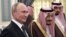 Russian President Vladimir Putin (left) and Saudi Arabia's King Salman attend the official welcome ceremony in Riyadh on October 14.