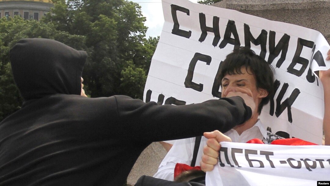 An activist is attacked during a gay pride parade that was unsanctioned by authorities in St. Petersburg, Russia, in June 2011.