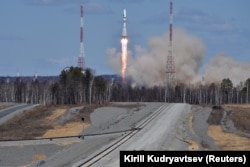 A Russian Soyuz 2.1a rocket carrying satellites lifts off from the new Vostochny Cosmodrome in April 2016.