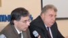 Armenia -- Finance Minister Tigran Davtian (L) at a news conference in Yerevan, 31 March 2010.