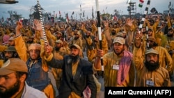 Supporters of Jamiat Ulema-e Islam shout slogans during an anti-government march in Islamabad on November 13.