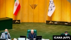 IRAN -- Iranian parliament speaker Mohammad-Bagher Ghalibaf (C) chairs a closed session to investigate the killing of Iran's top nuclear scientist Mohsen Fakhrizadeh, in Tehran, November 29, 2020