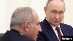 Russia - Russian President Vladimir Putin and Armenian Prime Minister Nikol Pashinian attend a meeting at the Kremlin, Moscow, April 1, 2026.