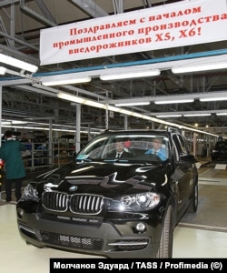 A BMW is driven off the production floor of Avtotor in July 2009 when the company began producing luxury sports utility vehicles (SUVs) for the German auto brand.