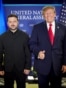 This handout photograph, taken and released by the Ukrainian Presidential Press Service on September 22, 2026, shows Ukraine's President Volodymyr Zelensky (L) and US President Donald Trump posing for a photo during their meeting on the sidelines of the 8