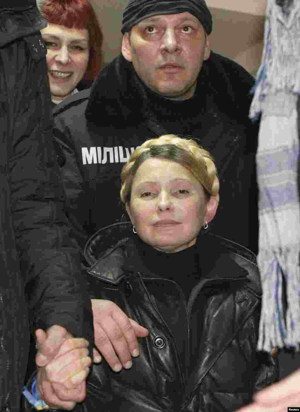Tymoshenko was held under guard in a prison hospital where she was being treated for severe and chronic back pain.&nbsp;