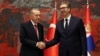 Turkish President Recep Tayyip Erdogan (left) meets Serbian President Aleksandar Vucic in Belgrade on October 11. 