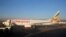 Workers service an Ethiopian Airlines Boeing 737-800 plane at the Bole International Airport in Ethiopia's capital Addis Ababa, January 26, 2017.
