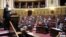 France -- Patrick Ollier (L), Parliamentary relations minister, speaks during the Senate vote session for a bill criminalizing the denial of the genocides, including the Armenian genocide, Paris, 23Jan2012