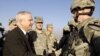 U.S. Defense Secretary Robert Gates meets with U.S. troops in Baghdad on December 20