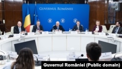 Premierul Ilie Bolojan și alți reprezentanți ai guvernului, la o întâlnire cu reprezentanții a 13 fonduri internaționale de investiții. 29 ianuarie 2026.