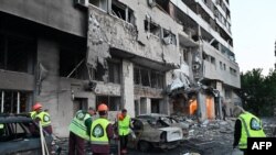 ფოტო არქივიდან. რუსული დრონებით შეტევის შედეგად დაზიანებული სახლი ხარკოვში. 2025 წლის 12 ივნისი