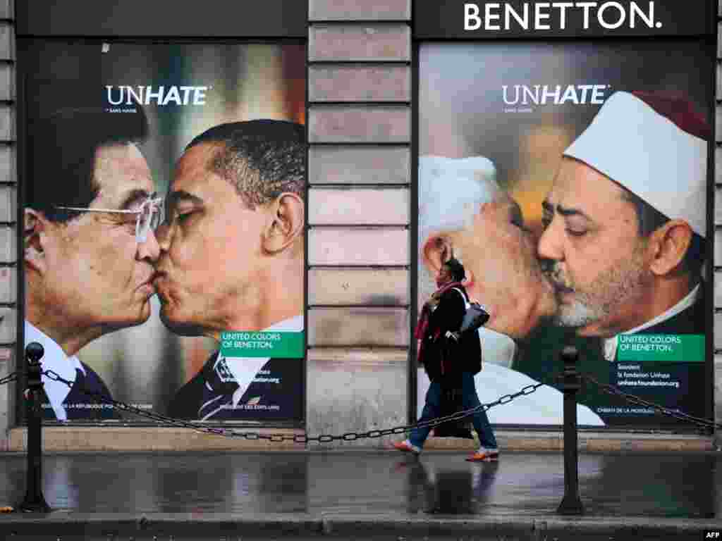 A Benetton clothing-store window is covered by posters as part of the launch of a provocative publicity campaign in Paris on November 17. (AFP Photo/Martin Bureau)