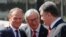 Donald Tusk, President of the European Council (left), Jean-Claude Juncker, the President of the European Commission (center), and Ukrainian President Petro Poroshenko in Kyiv on April 27. 