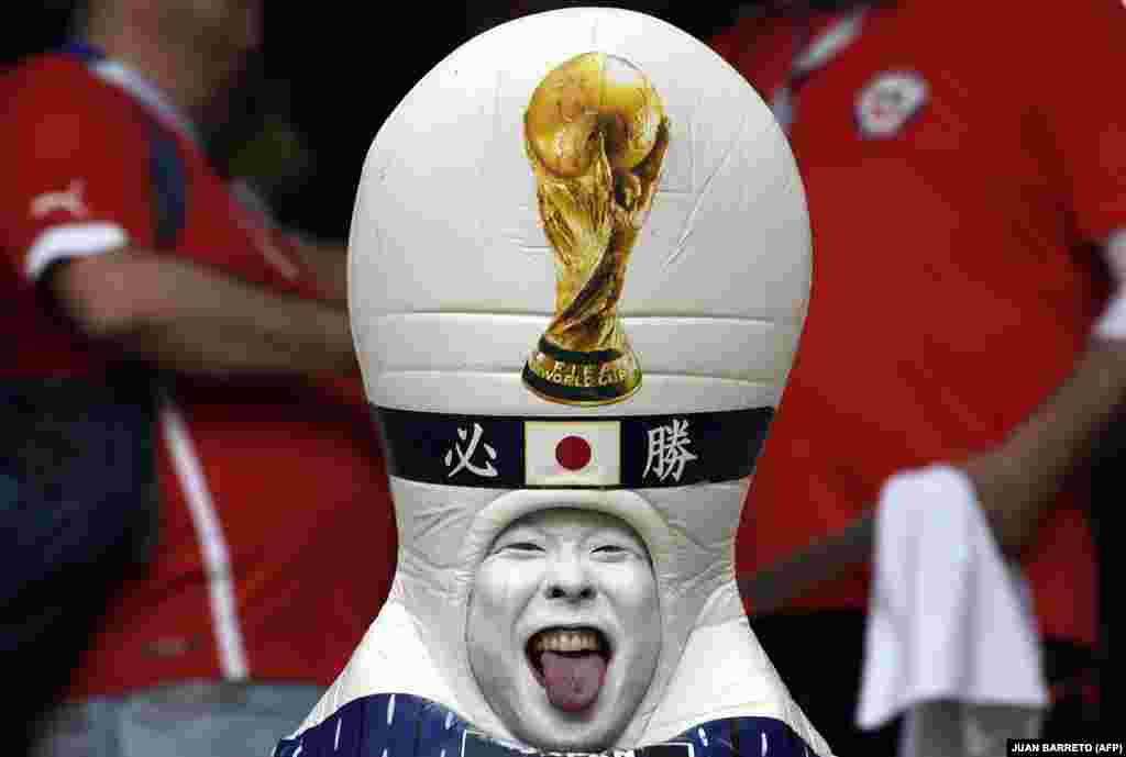 A Japanese fan sticks out his tongue before the Russia 2018 World Cup Group H football match between Colombia and Japan at the Mordovia Arena in Saransk. Japan won 2-1. (AFP/Juan Barreto)