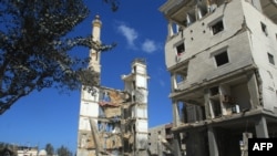 Urmările unui atac aerian israelian în orașul Sidon, situat în sudul litoralului Libanului, pe 9 aprilie 2026.