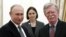 Russian President Vladimir Putin (left) meets with U.S. national-security adviser John Bolton in the Kremlin on October 23.