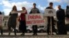 Protesters outside the Polish Embassy in Kyiv on October 31 decried what they said was a "homodictatorship."