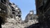 Syria - A handout picture released by the Syrian opposition's Shaam News Network on July 27, 2012 shows destruction in the Juret al-Shayah district of the central city of Homs, 27Jul2012