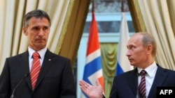 Russian President Vladimir Putin (right) with the next NATO Secetary-General Jens Stoltenberg (file photo)