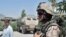 Канадский военнослужащий Международных сил по поддержанию безопасности несет патрульную службу в Кандагаре