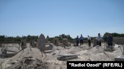 Tajikistan -- Cemetery in district of Bobojon Ghafurov, Sughd region, 24May2012