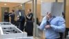 Троє обвинувачених у суді в день винесення вироку, 18 серпня 2026 року