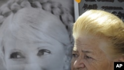 A Yulia Tymoshenko supporter at a rally at a tent camp outside the court in Kyiv on September 5