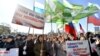 People gather at the Military Glory of the Pacific Fleet memorial to mark National Unity Day in the eastern city of Vladivostok on November 4.