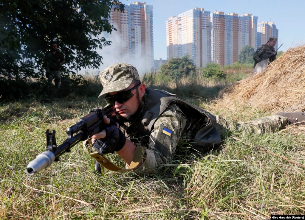 Local authorities say about 80 percent of reservists in Kyiv have their own weapons.