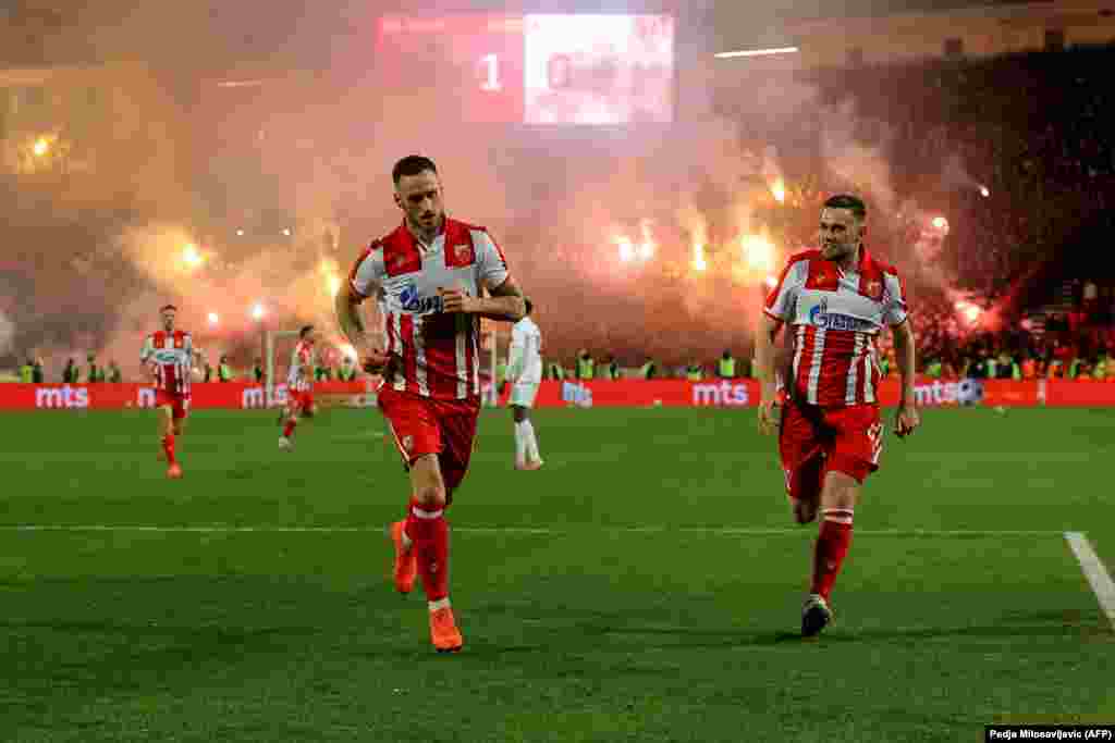 Red Star’s Marko Arnautovic (left) celebrates his team's second goal during a match on February 22 as Red Star headed for a 3-0 victory over archrivals Partizan.The match last weekend was the latest in a rivalry regarded as one of the most intense in European football. Games between Belgrade’s Red Star and Partizan teams are known for choreographed, arena-shaking shows of support from the stands as well as sometimes fiery displays of frustration.